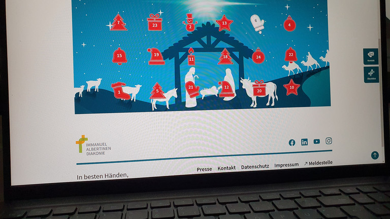 Bildschirm eines Notebooks mit geöffneter Internetseite Online-Adventskalender der Immanuel Albertinen Diakonie Bildschirm eines Notebooks mit geöffneter Internetseite Online-Adventskalender der Immanuel Albertinen Diakonie